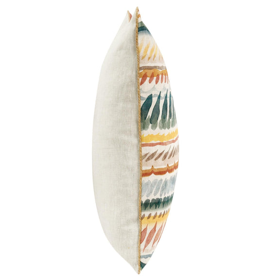 Side view of cream throw pillow with multicolor patterned insert and piped seam