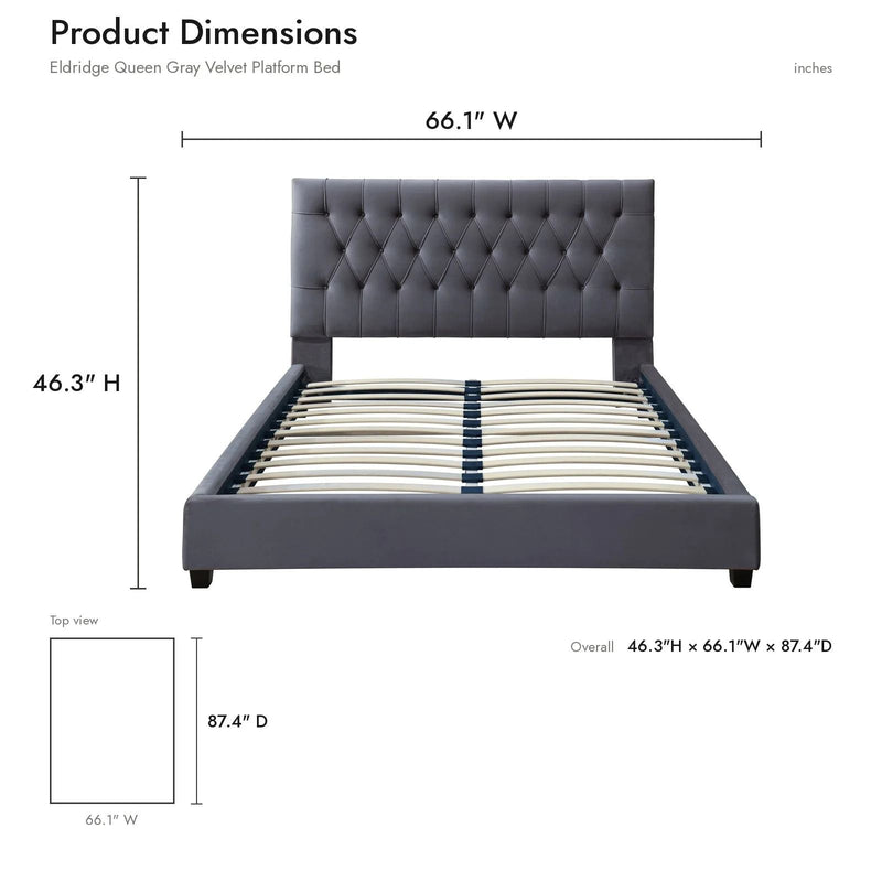 Dark gray upholstered platform bed with tufted button headboard and low frame