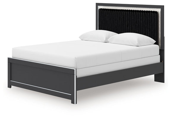 Upholstered panel bed with white mattress, black fabric headboard, dark side rails
