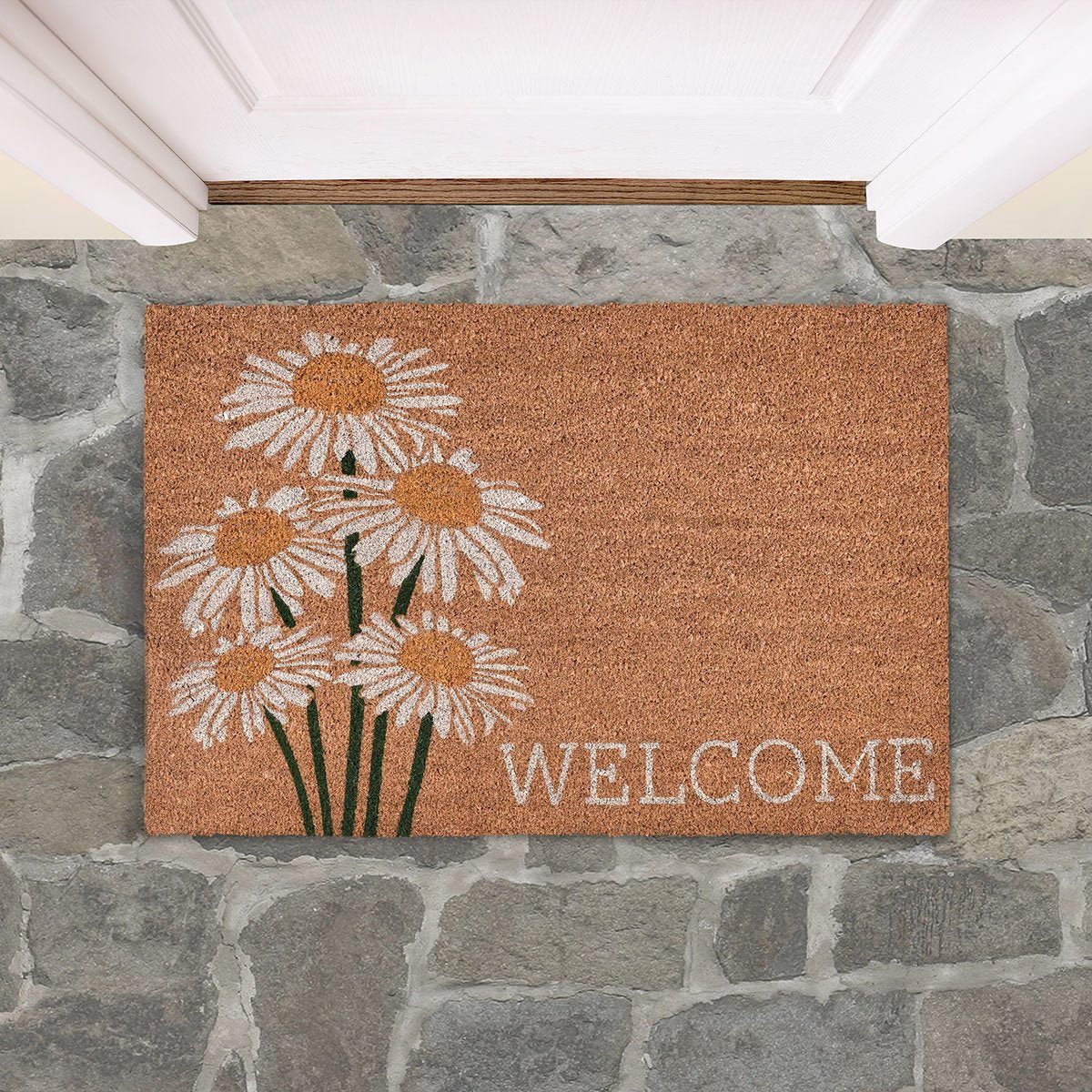 Brown doormat featuring white daisies and “WELCOME” text