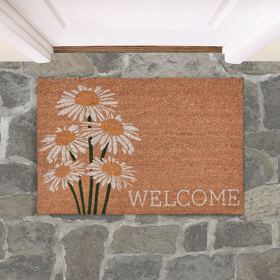 Brown doormat featuring white daisies and “WELCOME” text