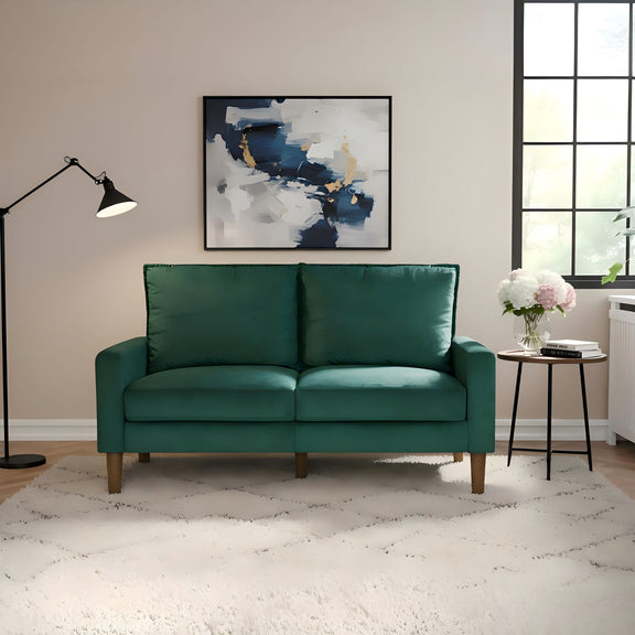 Dark green upholstered loveseat sofa with two seat cushions and tapered wooden legs
