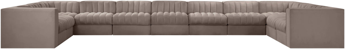 Gray velvet modular sectional sofa with tufted cushions and square arms