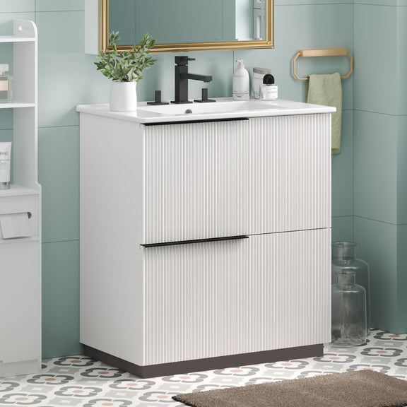 White fluted bathroom vanity with ceramic sink and soft-close slides, black handle