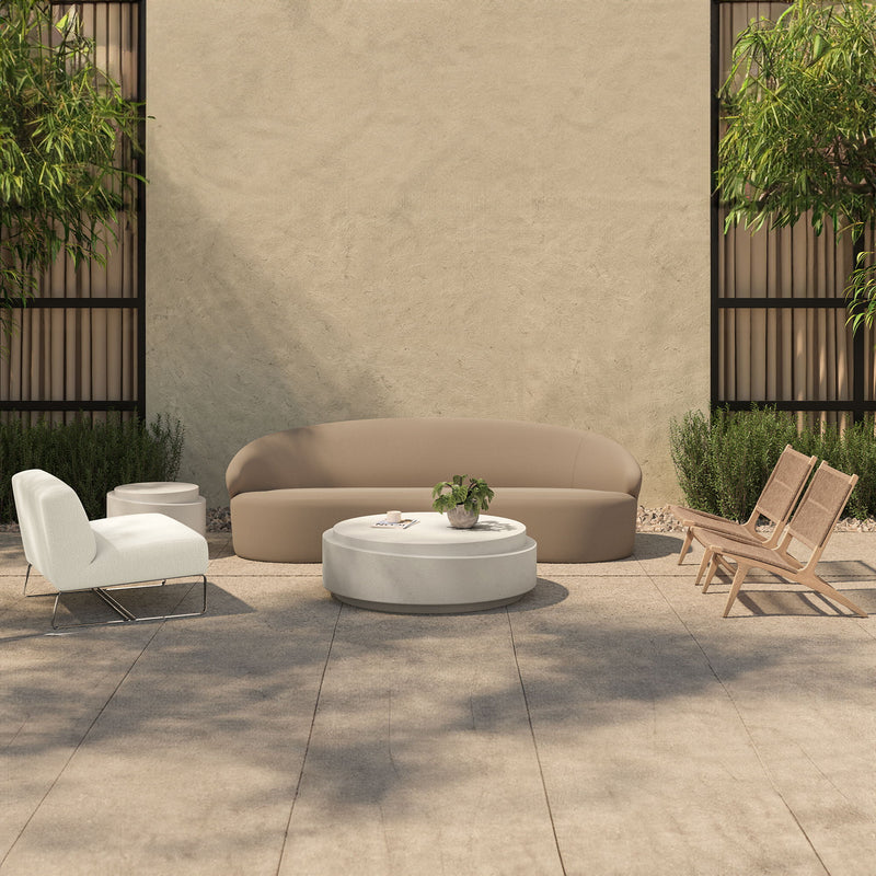 Taupe outdoor sofa with rounded backrest and smooth upholstery