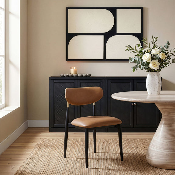 Dining side chair with brown upholstered seat and back, black legs