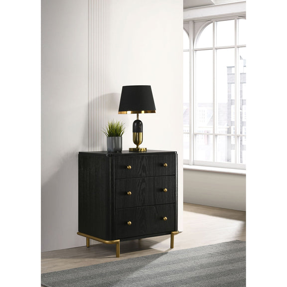 Black 3-drawer nightstand with gold-tone knobs and tapered gold legs