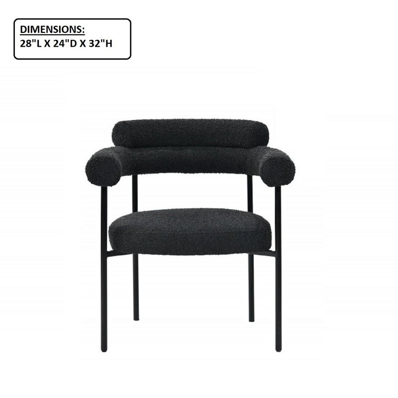 Black dining chair with armrests, rounded backrest and seat, black frame; 28x24x32 in