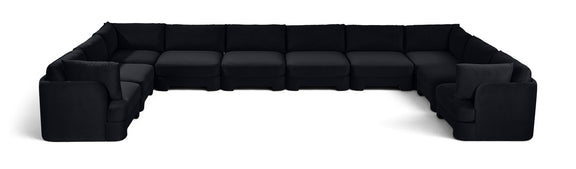 10-piece velvet sectional sofa, black modular L-shape with chaise and ottoman-style seats.