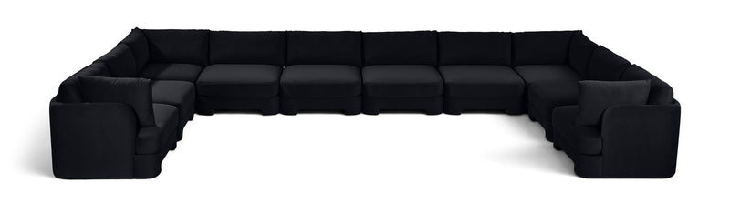 10-piece velvet sectional sofa, black modular L-shape with chaise and ottoman-style seats.