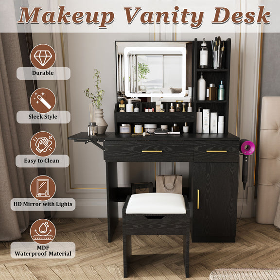 Black vanity desk with lit mirror, storage shelves, drawers, cabinet, and stool