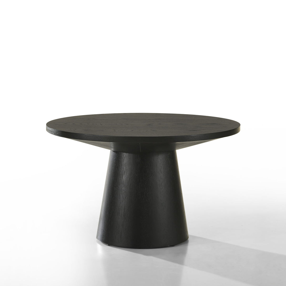 Black round table with flared pedestal base and circular tabletop, full view