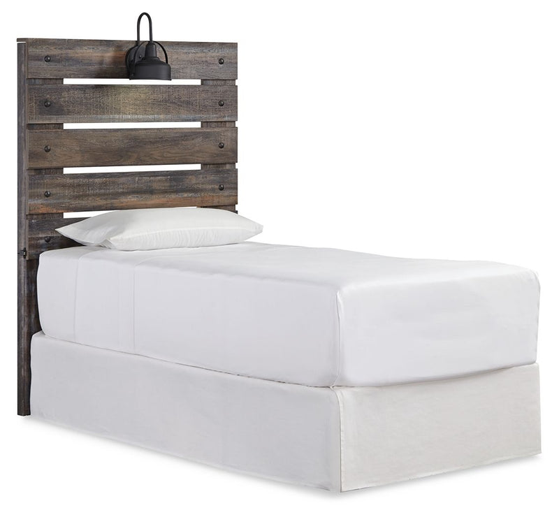 Rustic wood panel headboard with black lamp, styled with white bedding and pillows