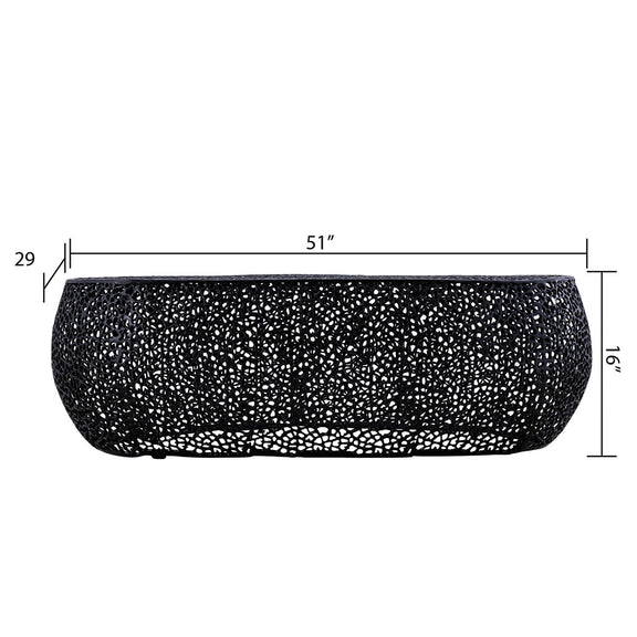 Black oval coffee table with speckled textured mosaic finish and curved side profile