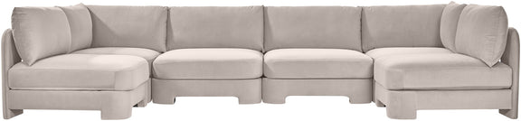 U-shaped armless sectional sofa, light gray velvet upholstery with tufted back cushions