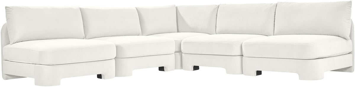White velvet armless sectional sofa with modular L-shape and padded back cushions