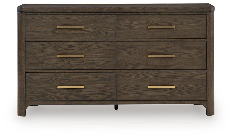 Dark brown wood dresser with six drawers and gold bar drawer pulls