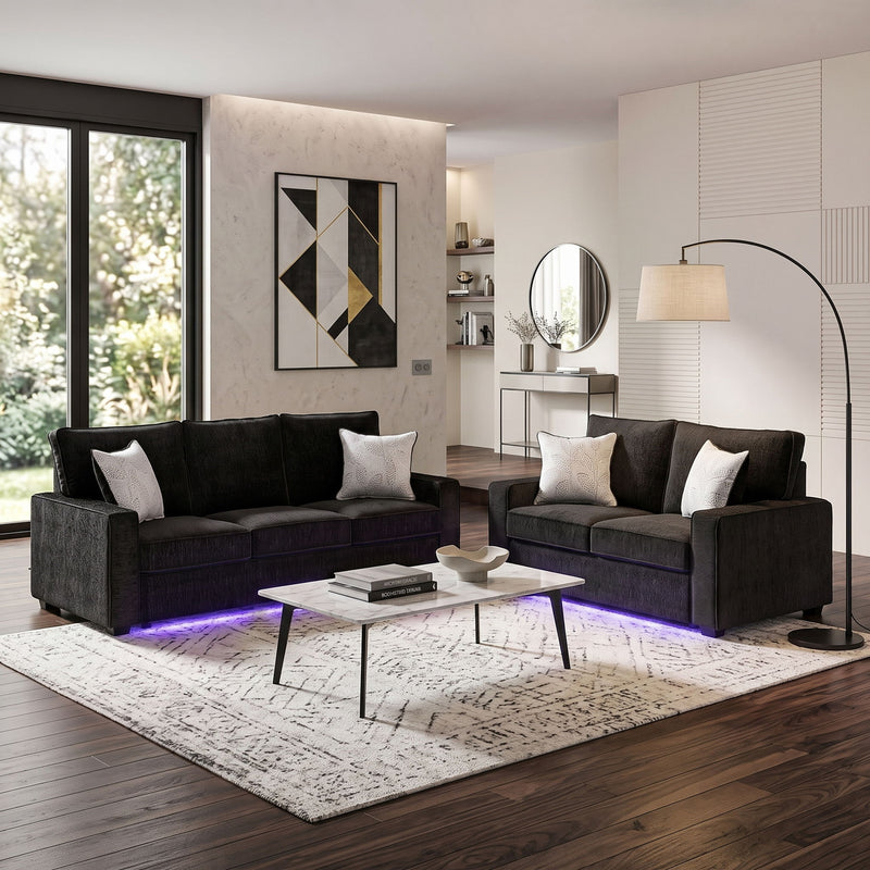 Rita LED living room set: black sofa set with pillows and glowing LED base