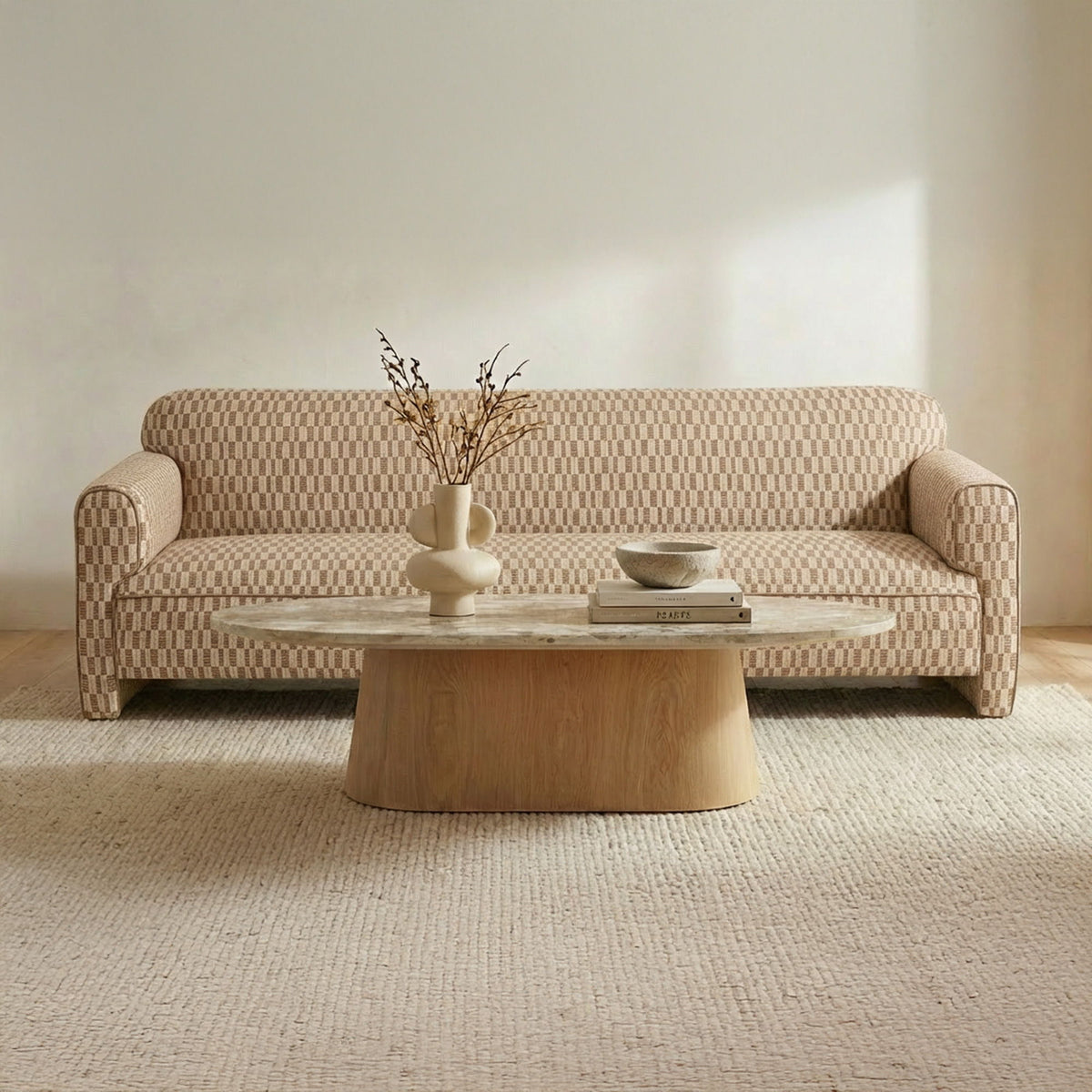 Taupe patterned sofa with rolled arms and squared back, front view