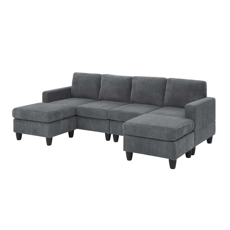Dark gray modular sectional sofa with two ottomans and cushioned chaise seating