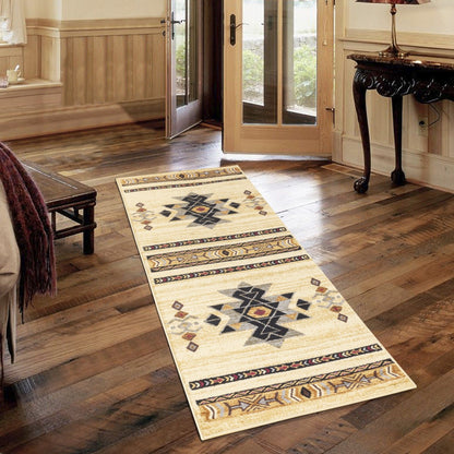 Beige geometric area rug runner with central starburst and patterned border trim