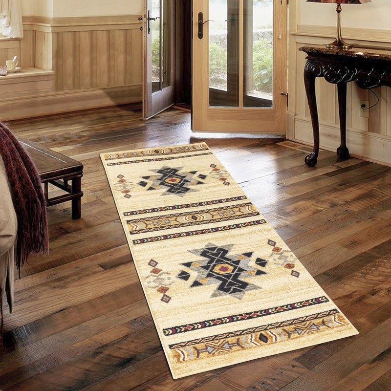 Beige geometric area rug runner with central starburst and patterned border trim