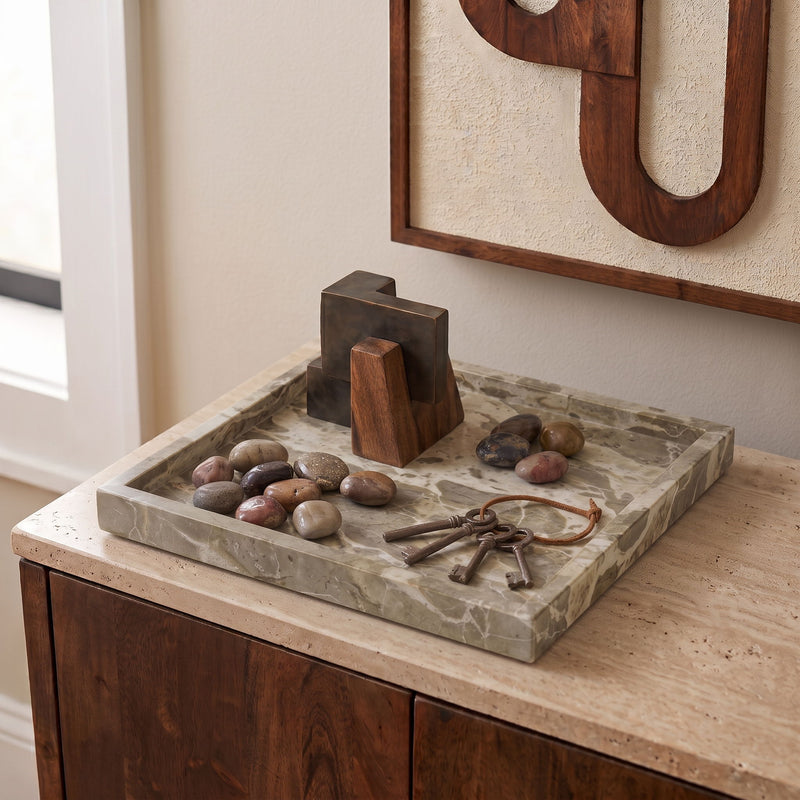 Rectangular gray marble tray with mottled pattern and shallow side walls