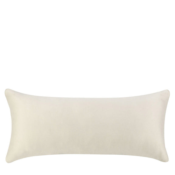 Solid ivory lumbar pillow with smooth fabric and piped edges