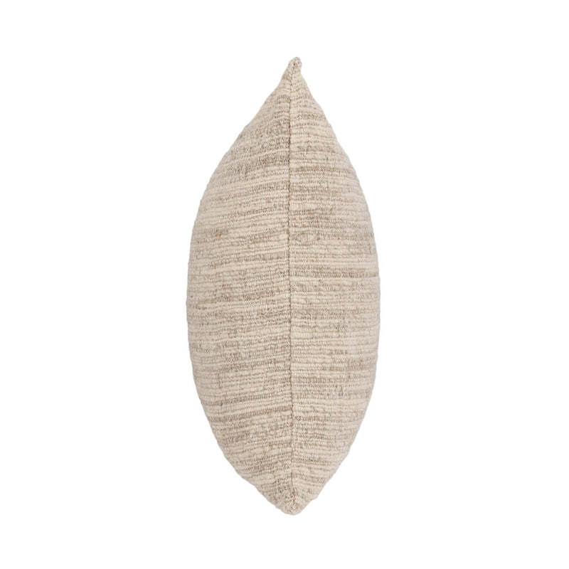 Natural woven pillow cover, side view showing stitched seam and end edge