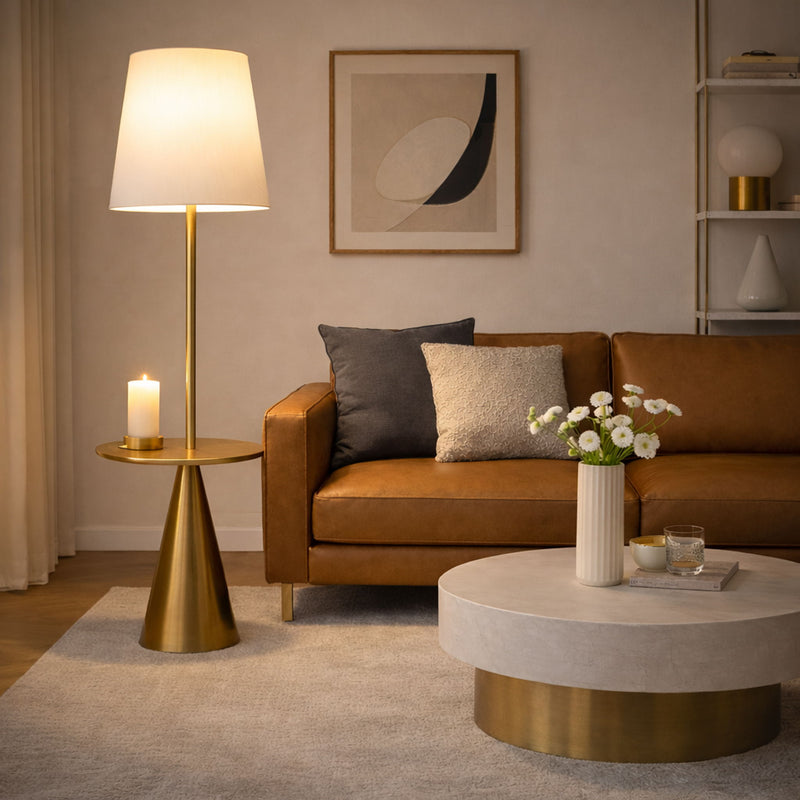 Modern floor lamp with white drum shade and round gold accent side table
