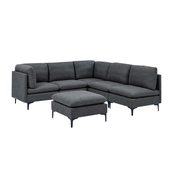 Modular L-shaped sectional sofa with tall legs, upholstered in dark gray, includes ottoman