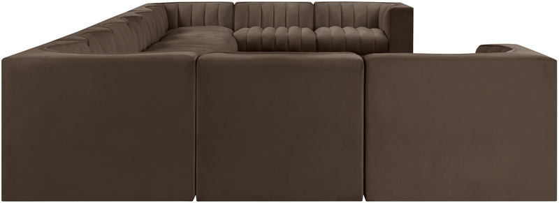 Dark brown velvet modular sectional sofa with tufted back and panel arms