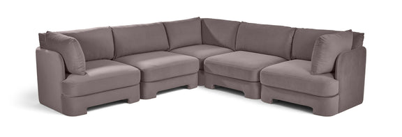 Light gray velvet corner sectional sofa with five-piece modular L-shape and cushioned arms