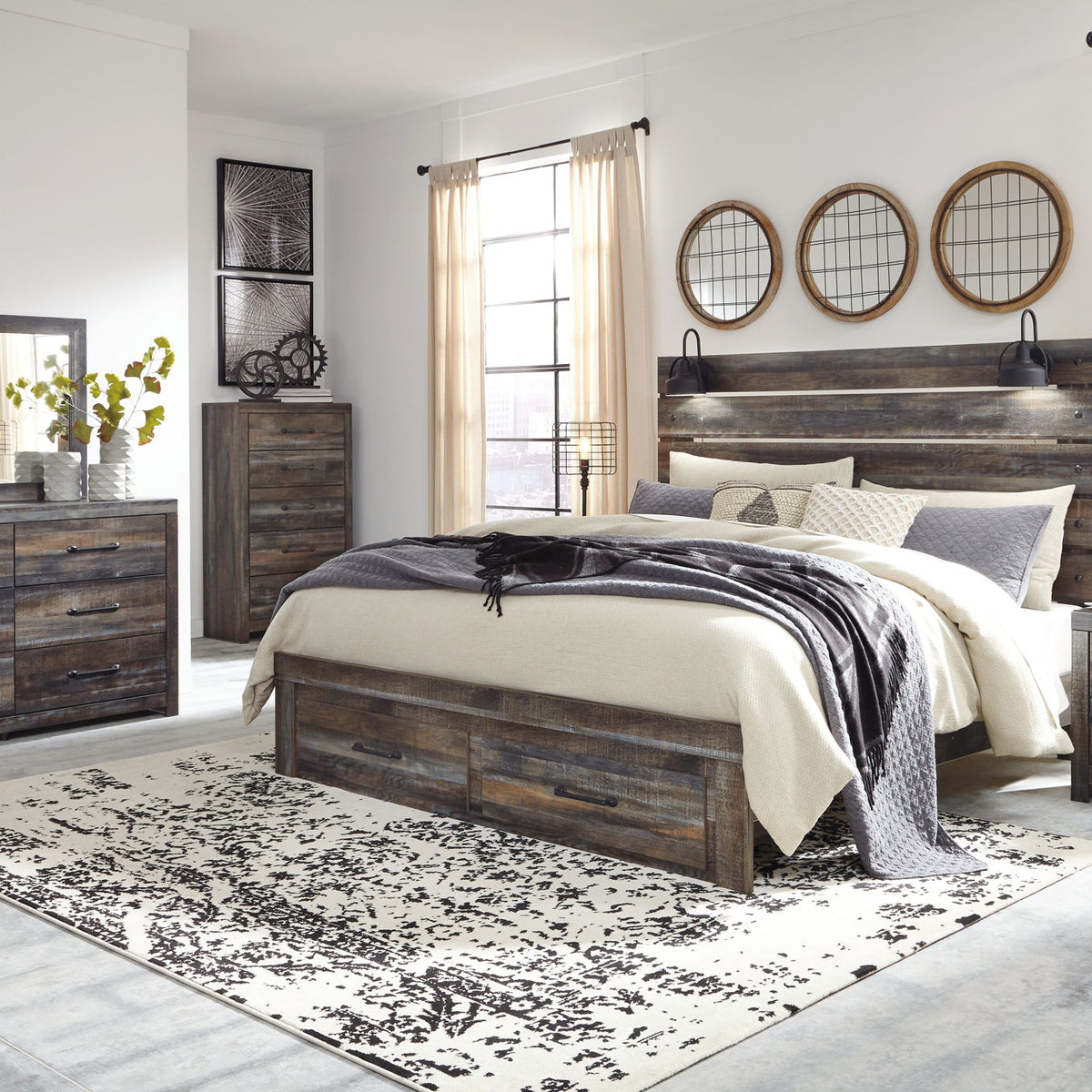 Panel bed with dark wood frame, beige and gray bedding, and side storage drawers