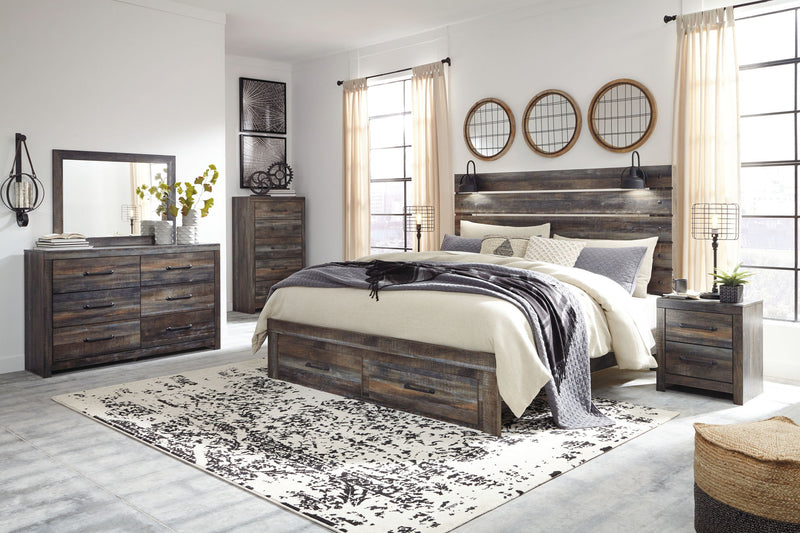 Panel bed with dark wood frame, beige and gray bedding, and side storage drawers