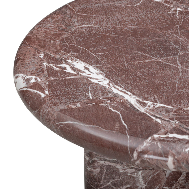 Close-up of dark red tabletop with prominent white marble veining