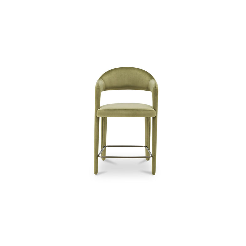 Green velvet counter stool with curved back, upholstered seat, and metal ring footrest.
