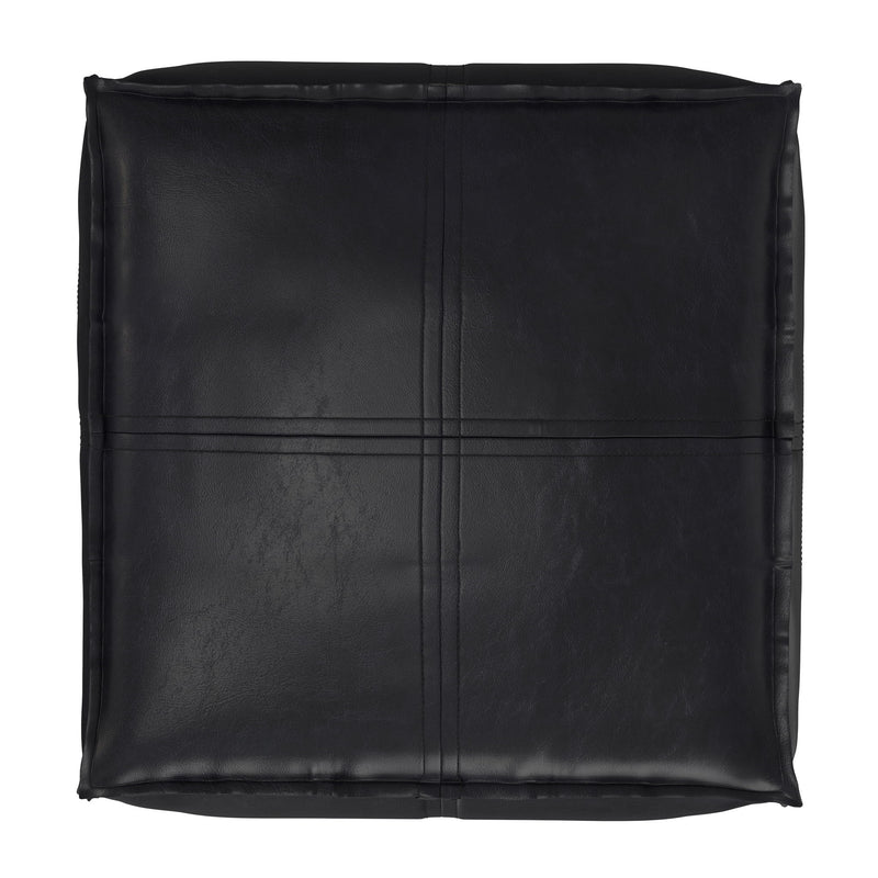 Black square pouf cover with stitched cross-panel seams and rounded edges.