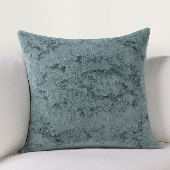 SLD decorative pillow in muted blue with distressed texture, square front