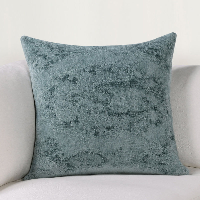 SLD decorative pillow in muted blue with distressed texture, square front