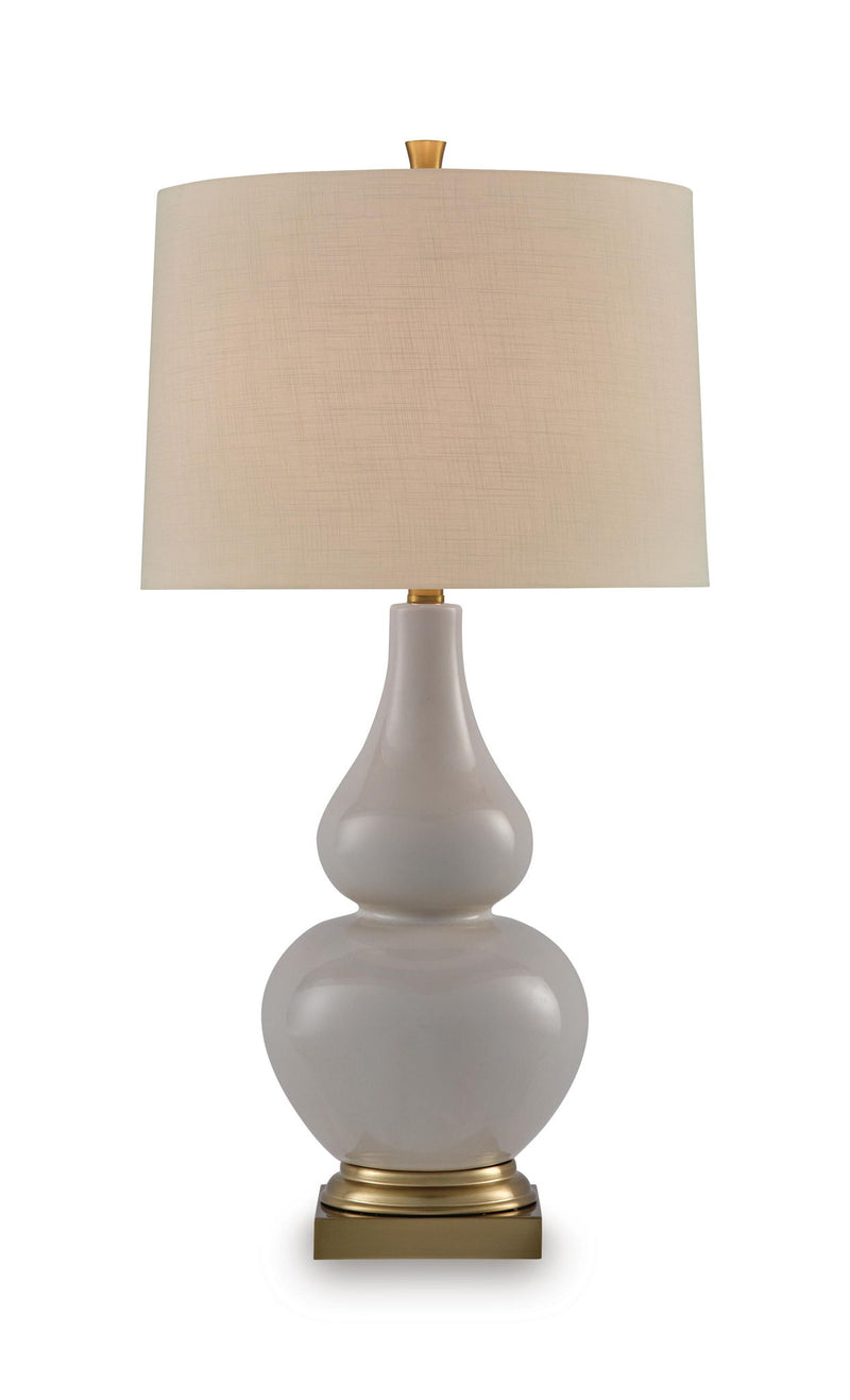 Ceramic table lamp with cream fabric shade, gray body, and gold base