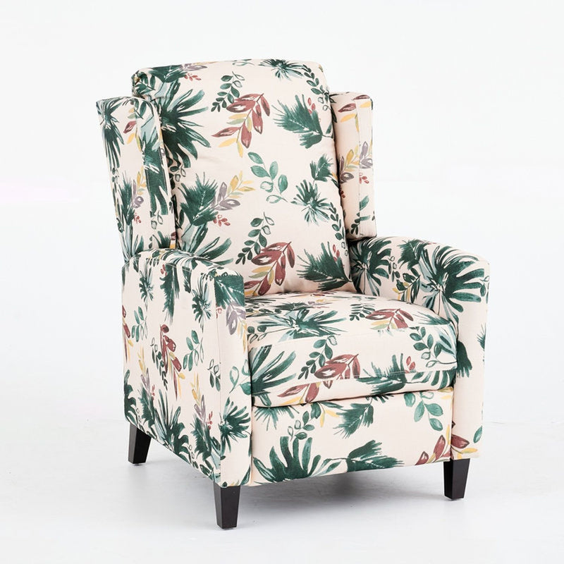 Green floral wingback recliner chair with padded arms and cushioned seat