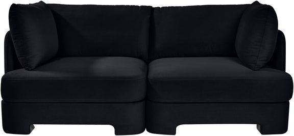 Black velvet upholstered loveseat with two-seat base and padded back cushions