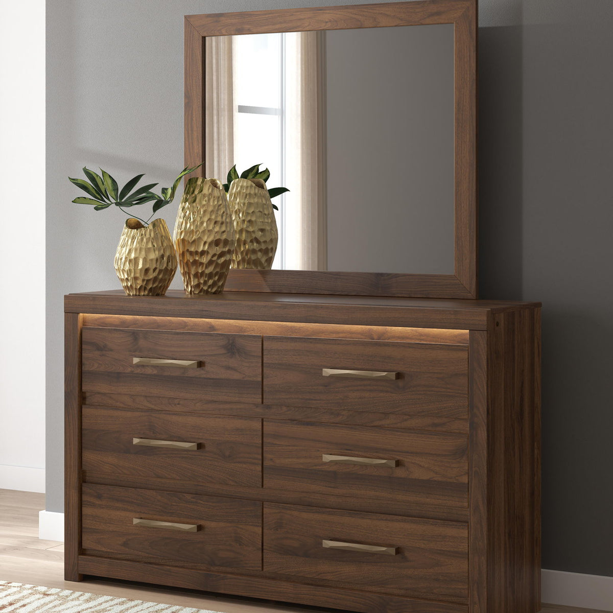 Light brown wood six-drawer dresser with rectangular mirror and bar drawer pulls