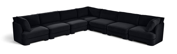 Black velvet corner sectional sofa with 7-piece modular arrangement