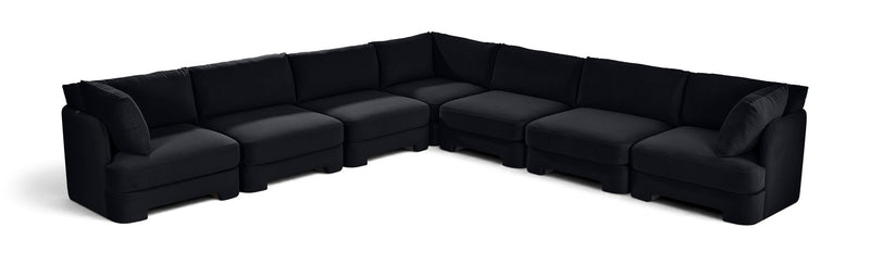 Black velvet corner sectional sofa with 7-piece modular arrangement