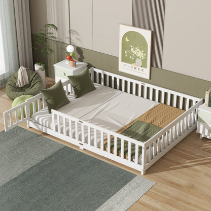 Queen size white floor bed with safety guardrails and slatted fence sides