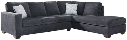Dark gray sleeper sectional sofa with chaise corner and textured fabric upholstery