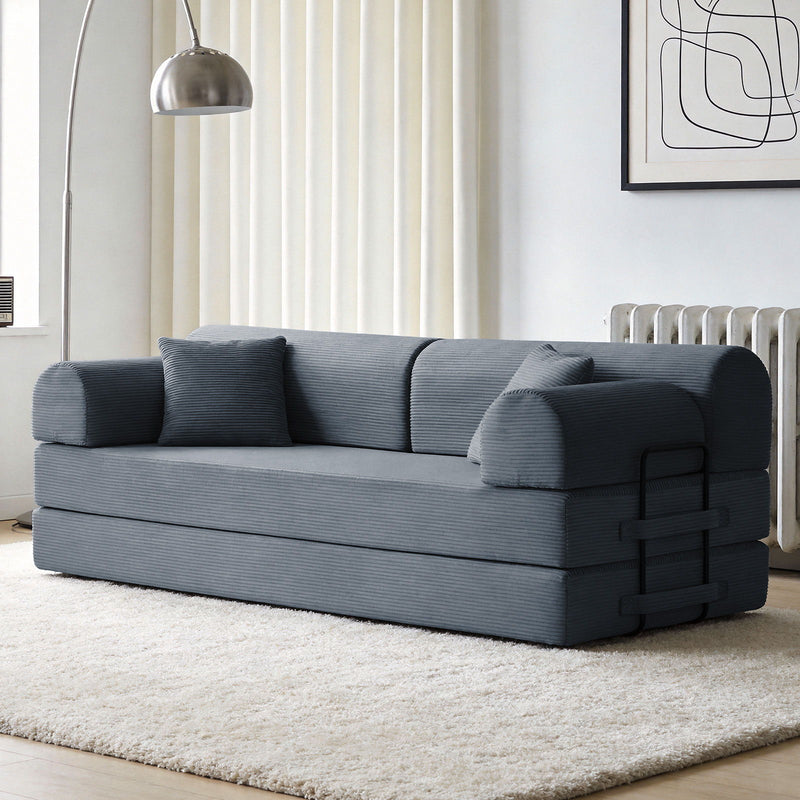 Blue-gray convertible sleeper sofa bed with rounded armrests and three back cushions