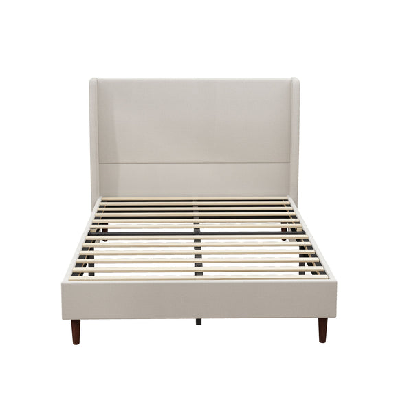 Beige upholstered bed with tall headboard, wooden slats, and tapered legs
